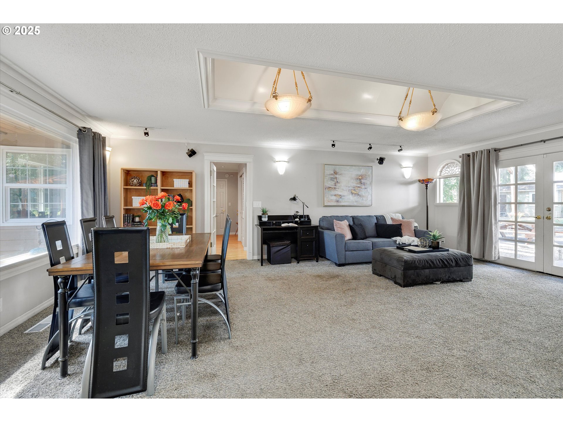 8815 Southwest Oleson Road Portland, OR 97223 - Photo 12 of 46 a living room with furniture and a large window