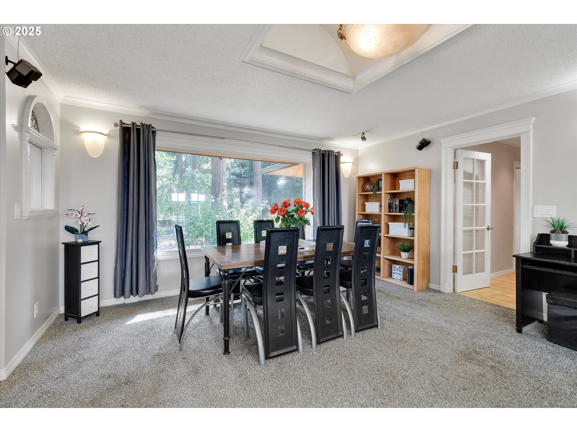 8815 Southwest Oleson Road Portland, OR 97223 - Photo 13 of 46 a dining room with furniture window and wooden floor