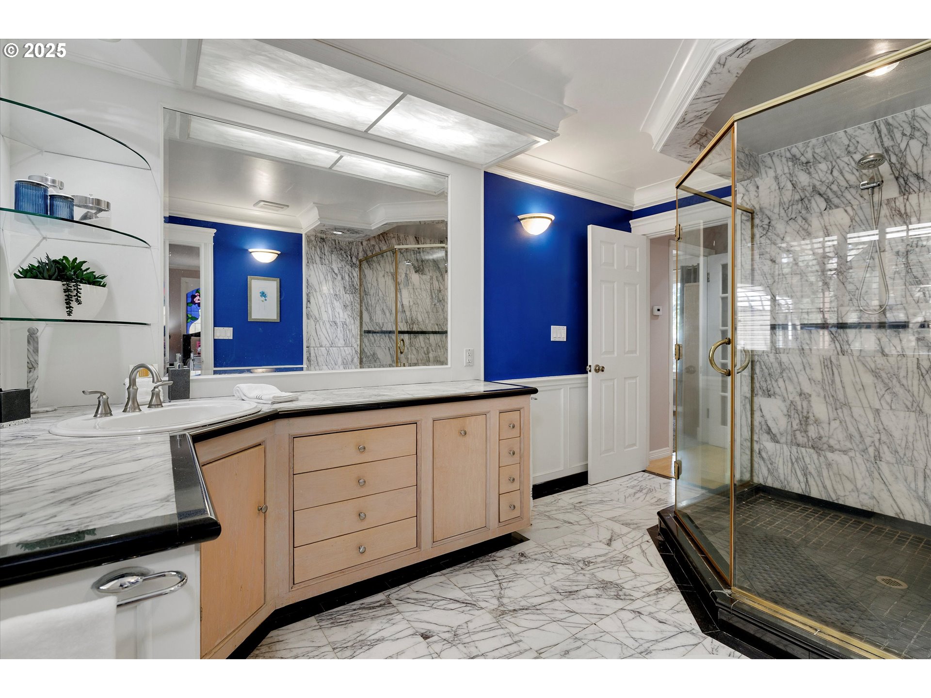 8815 Southwest Oleson Road Portland, OR 97223 - Photo 15 of 46 a large bathroom with a granite countertop sink a toilet a mirror and shower