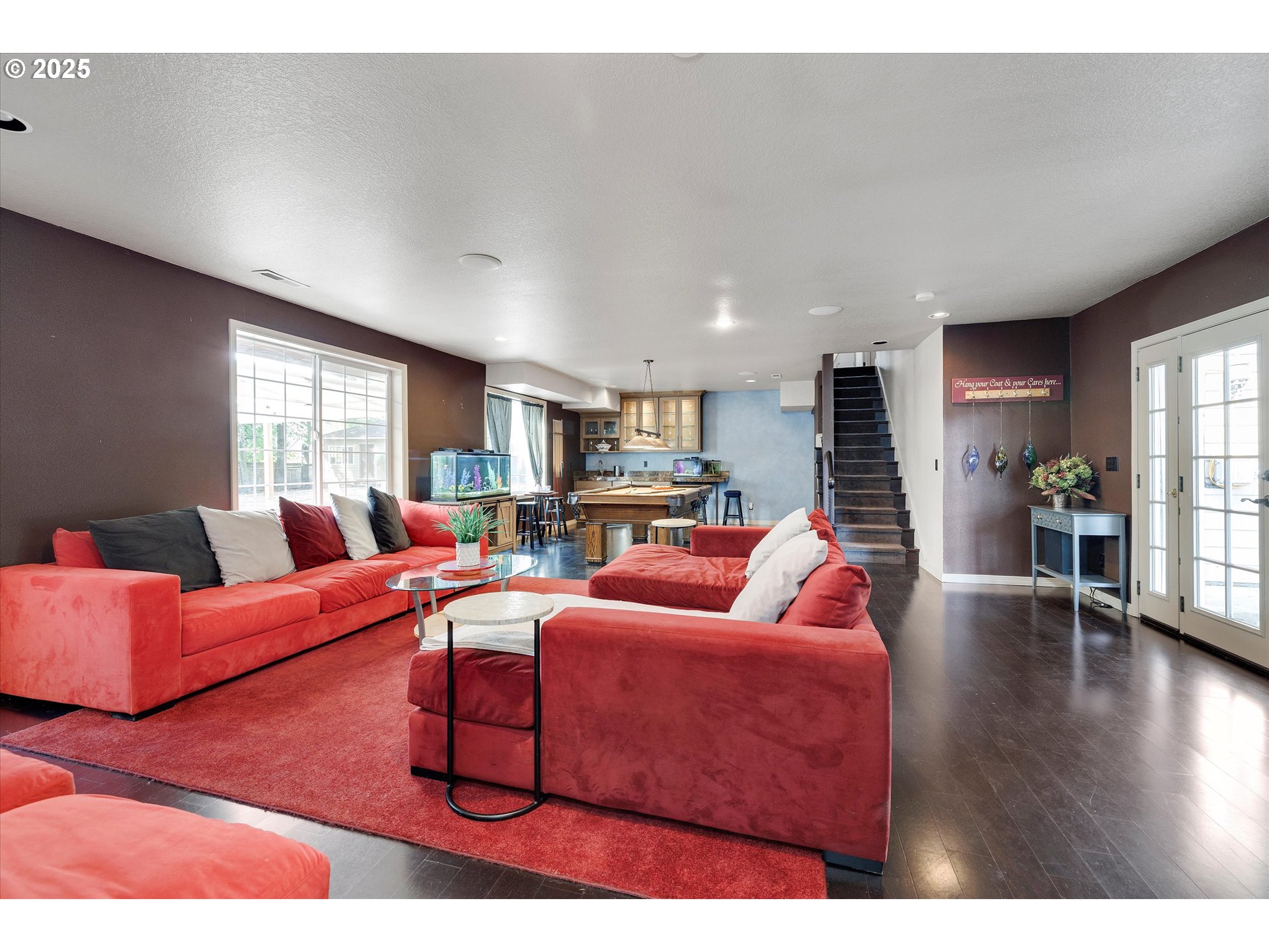 8815 Southwest Oleson Road Portland, OR 97223 - Photo 25 of 46 a living room with furniture wooden floor and a large window