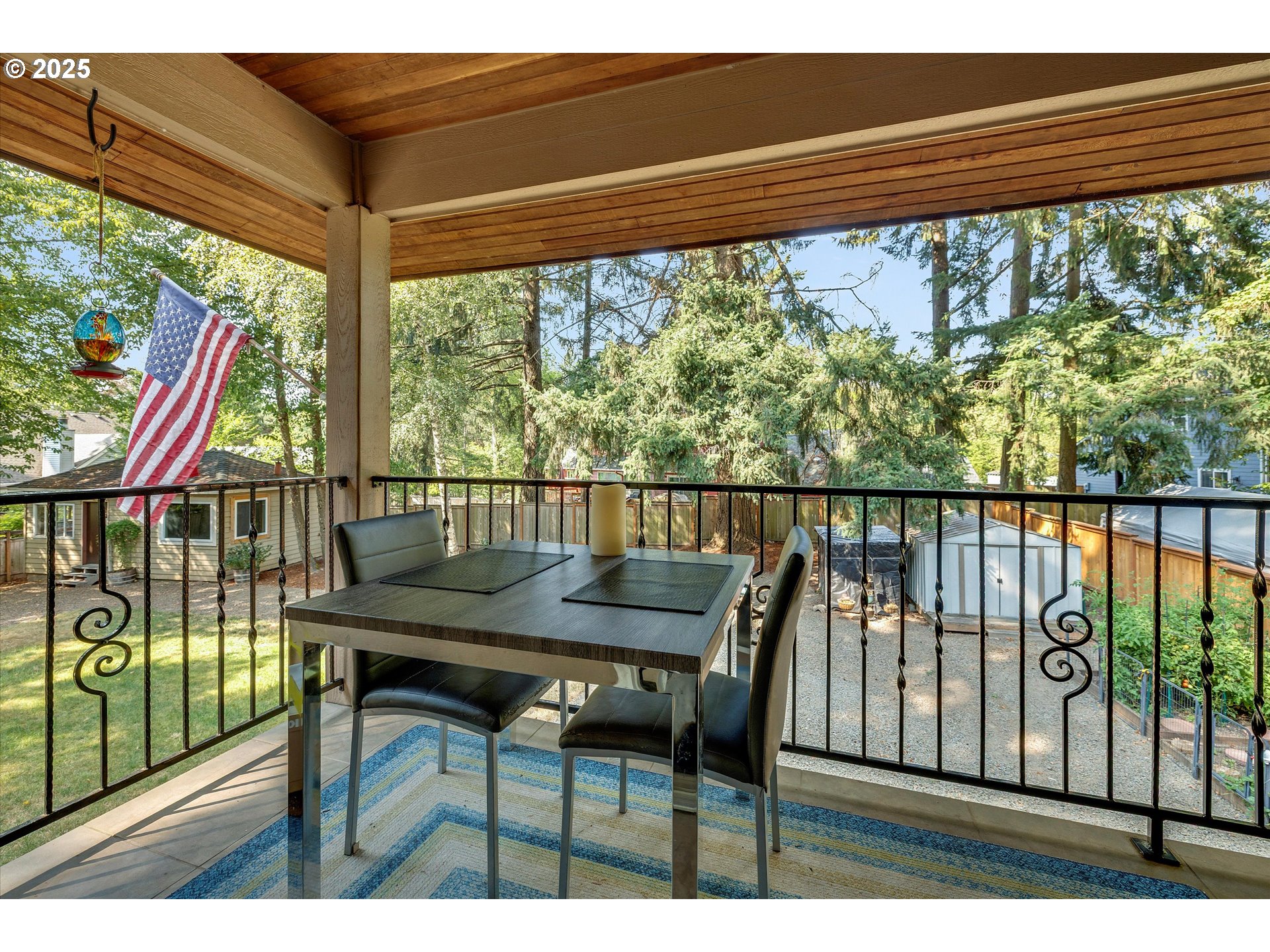 8815 Southwest Oleson Road Portland, OR 97223 - Photo 29 of 46 a view of a chairs and table in the balcony