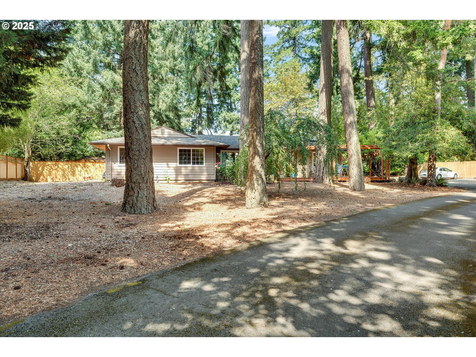 8815 Southwest Oleson Road Portland, OR 97223 - Photo 3 of 46 a view of outdoor space with deck and backyard