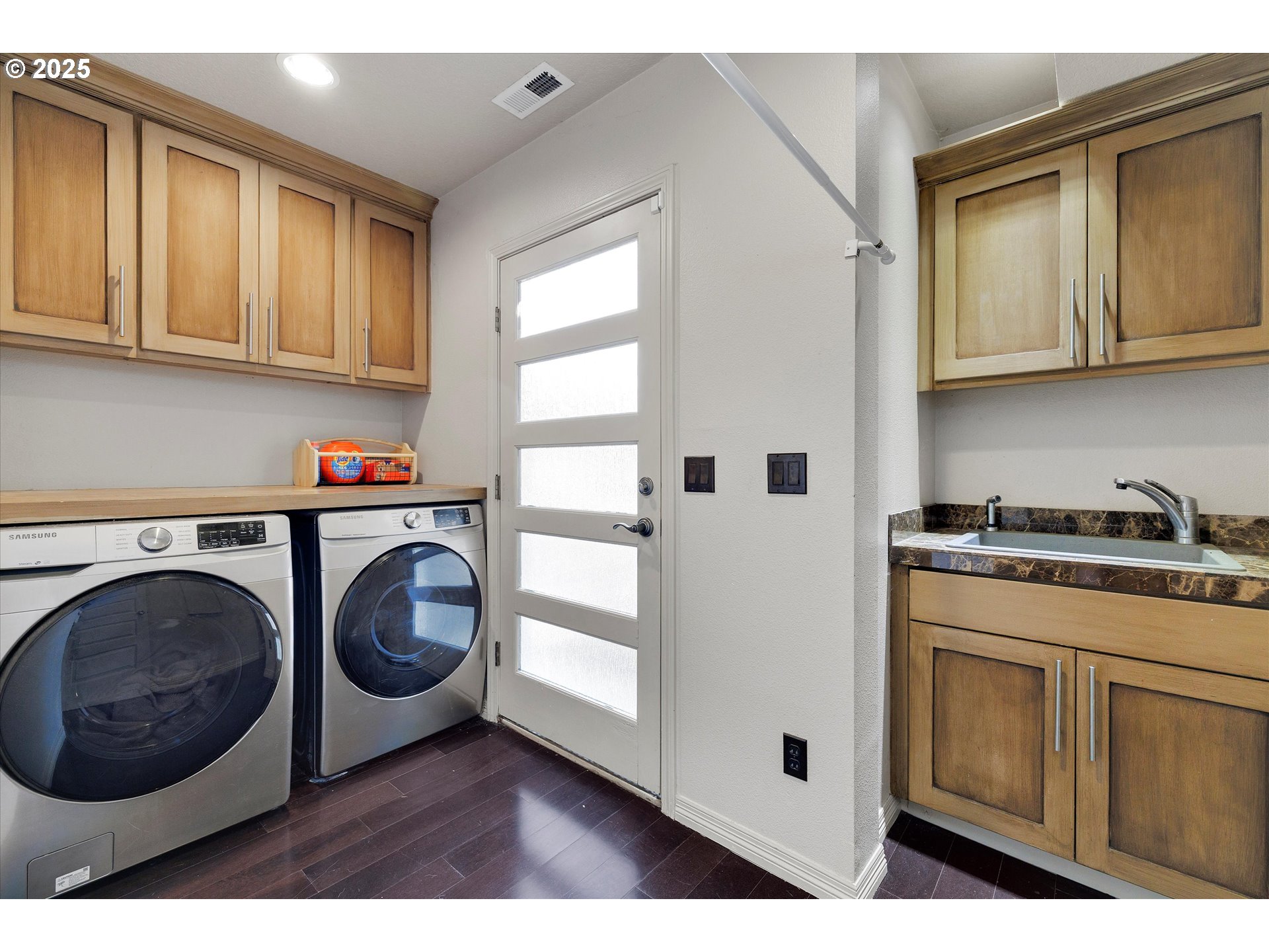 8815 Southwest Oleson Road Portland, OR 97223 - Photo 36 of 46 a utility room with sink dryer and washer