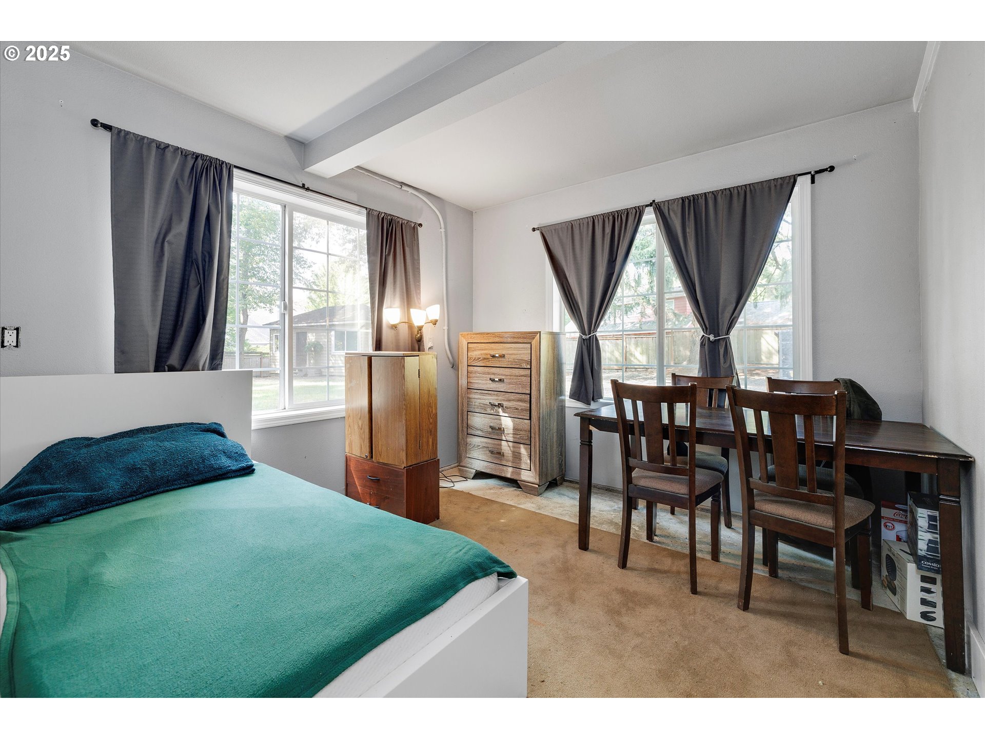 8815 Southwest Oleson Road Portland, OR 97223 - Photo 37 of 46 a living room with furniture and a large window