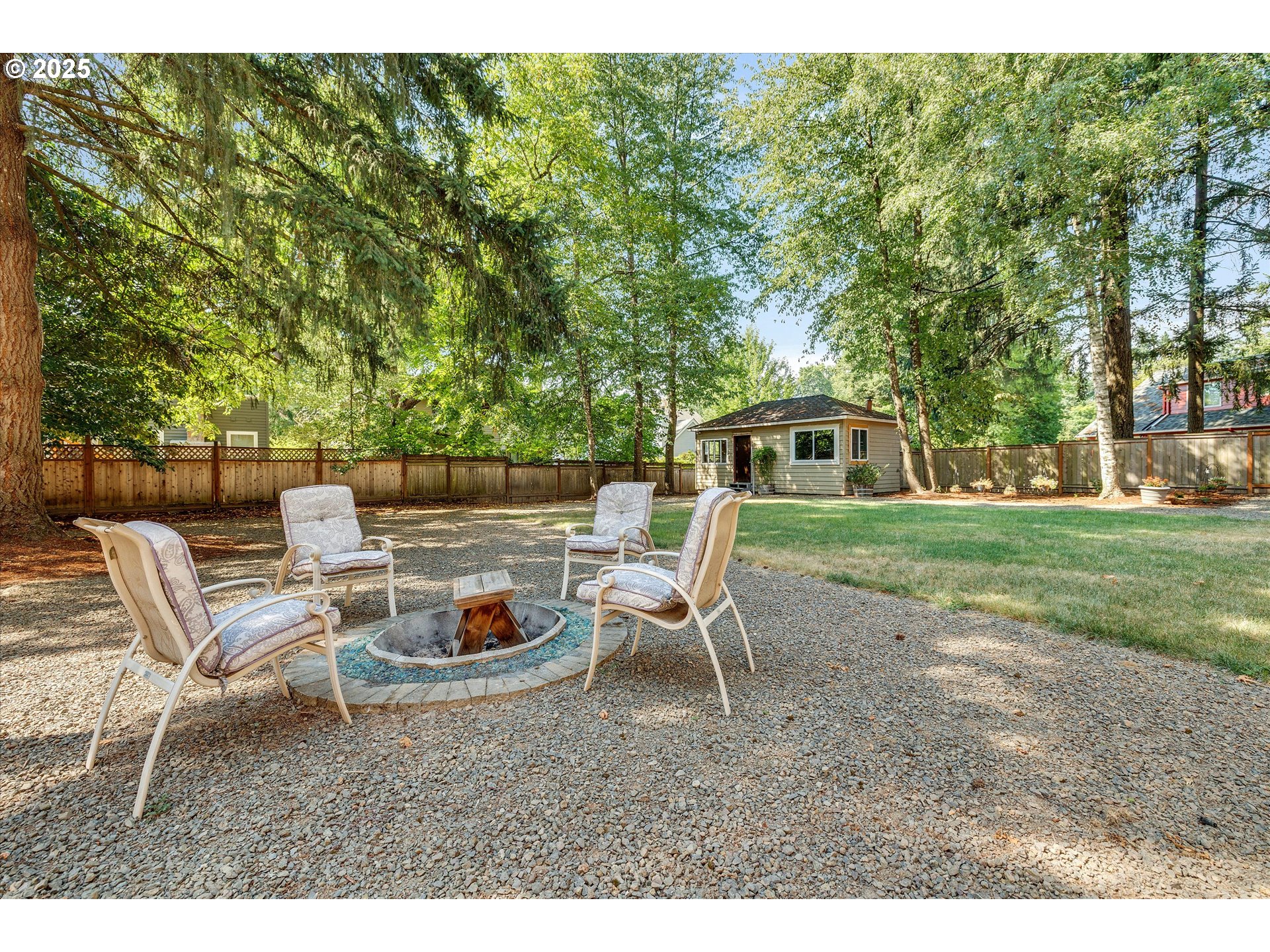 8815 Southwest Oleson Road Portland, OR 97223 - Photo 41 of 46 a backyard of a house with outdoor seating