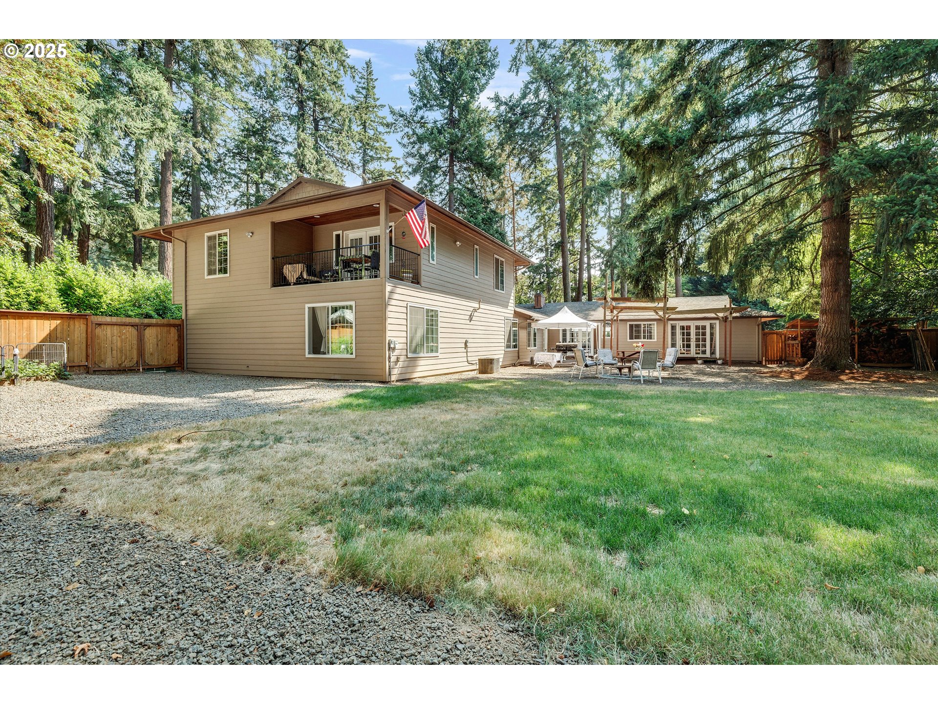 8815 Southwest Oleson Road Portland, OR 97223 - Photo 43 of 46 a house view with a sitting space and garden