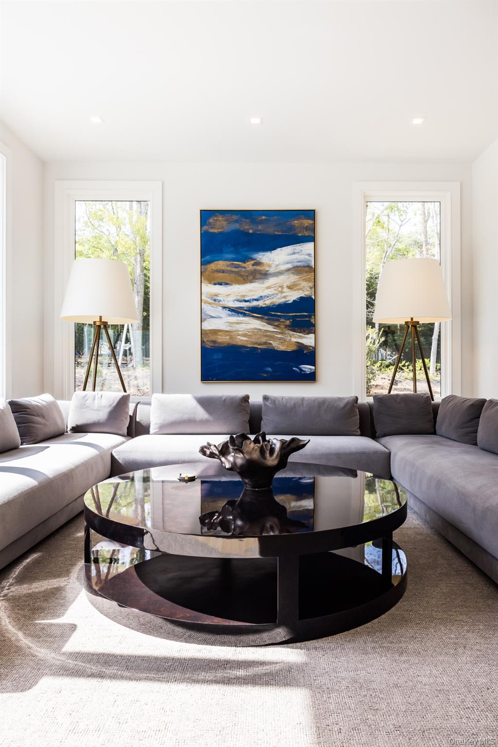 1552 Deerfield Road Water Mill, NY 11976 - Photo 14 of 37 a living room with furniture and a large window