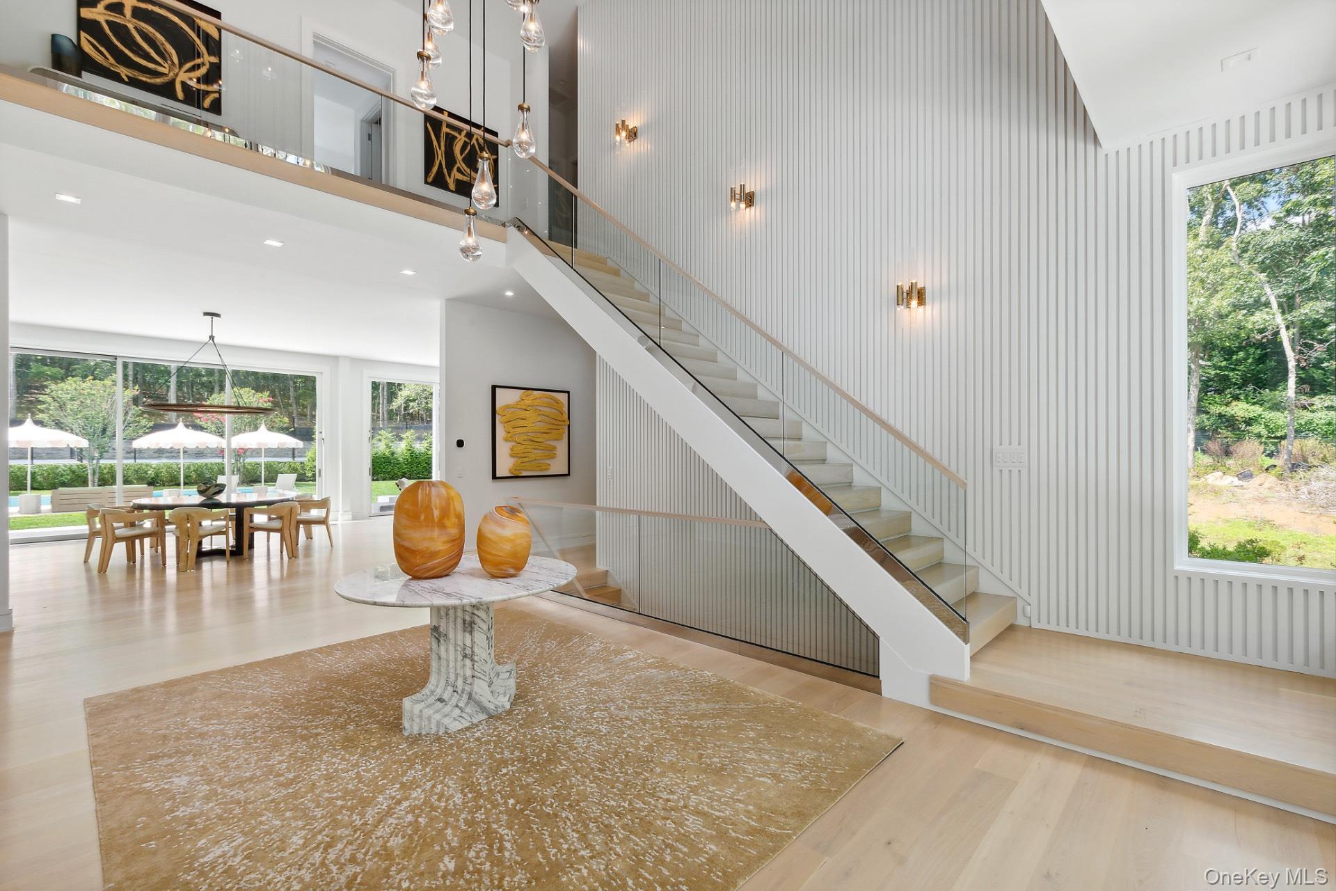 1552 Deerfield Road Water Mill, NY 11976 - Photo 15 of 37 a living room with furniture and a large window
