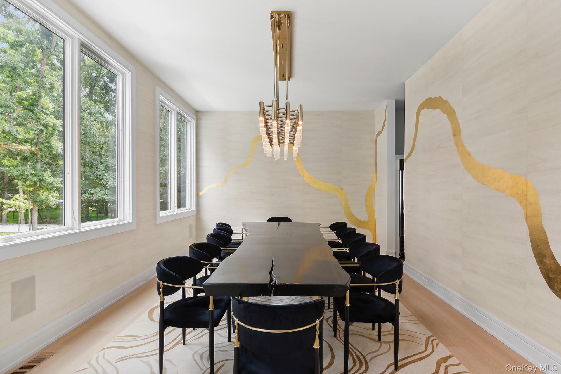 1552 Deerfield Road Water Mill, NY 11976 - Photo 16 of 37 a view of a dining room with furniture and window