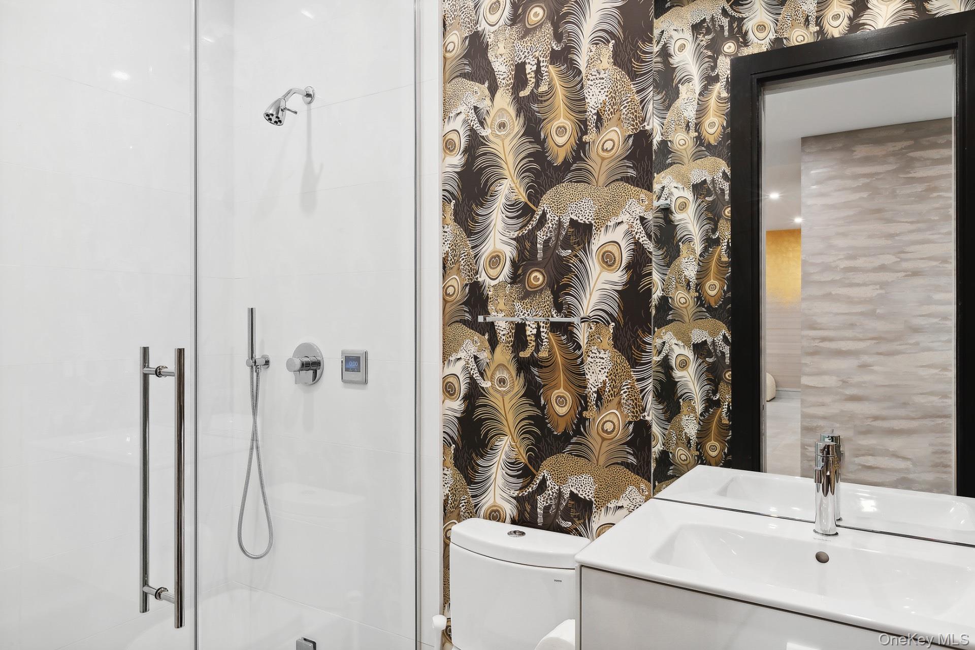 1552 Deerfield Road Water Mill, NY 11976 - Photo 32 of 37 a bathroom with a sink and a mirror