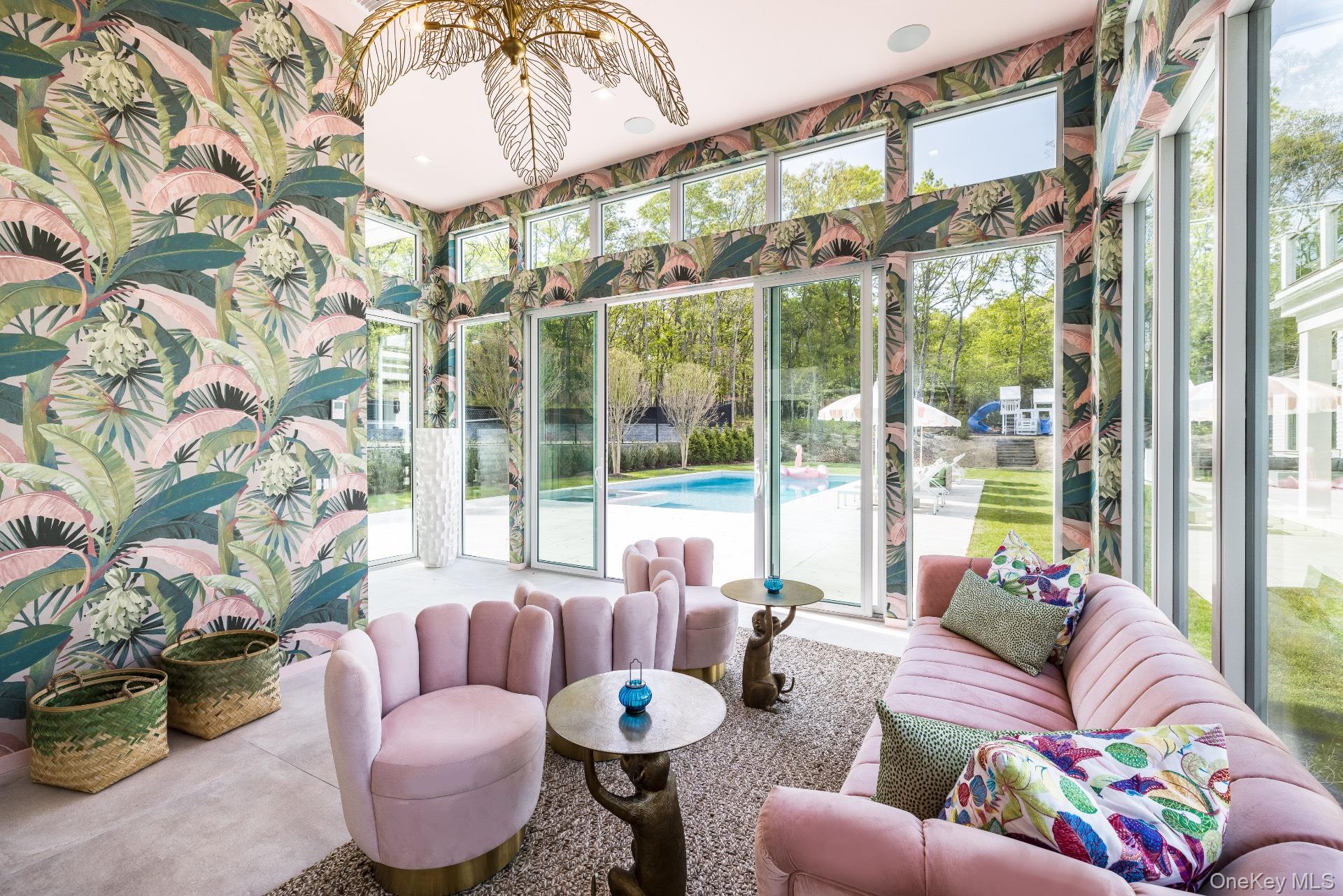 1552 Deerfield Road Water Mill, NY 11976 - Photo 7 of 37 a living room with furniture and a large window