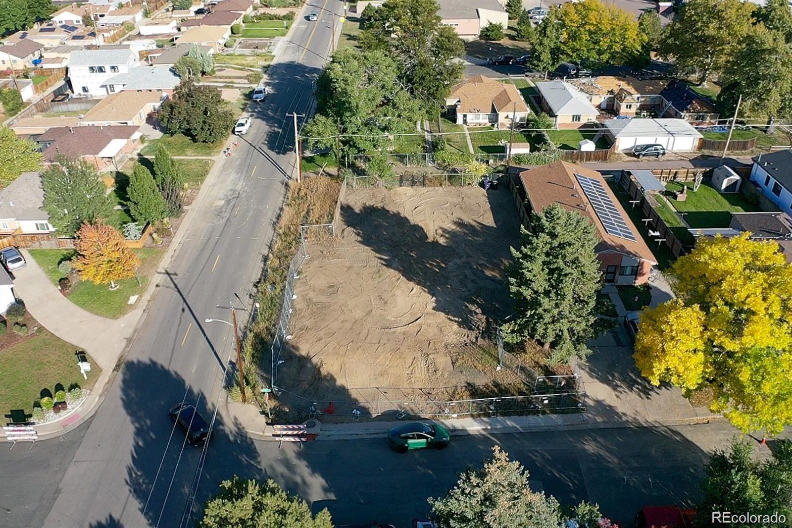 2882 Monroe Street Denver, CO 80205 - Photo 4 of 6 an aerial view of residential houses with outdoor space