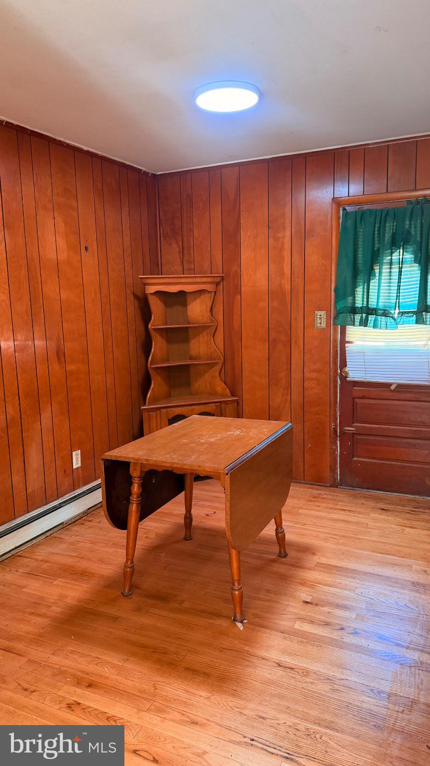 711 Rigby Avenue Cambridge, MD 21613 - Photo 11 of 21 Cozy room with warm wooden accents.