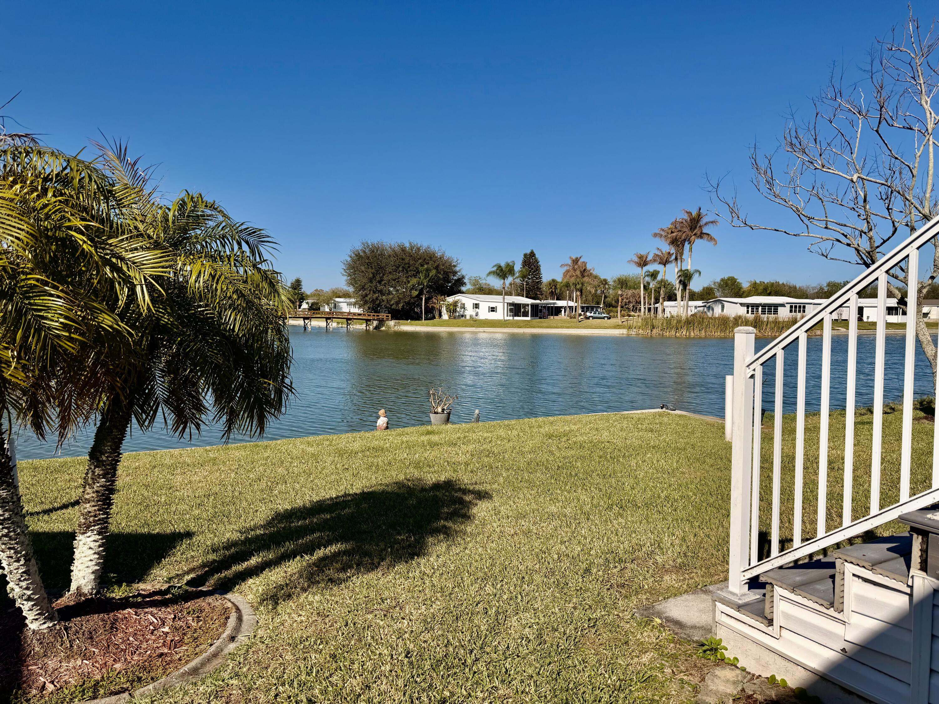 1692 Southwest 35th Circle Okeechobee, FL 34974 - Photo 2 of 30 a view of a swimming pool with a chair