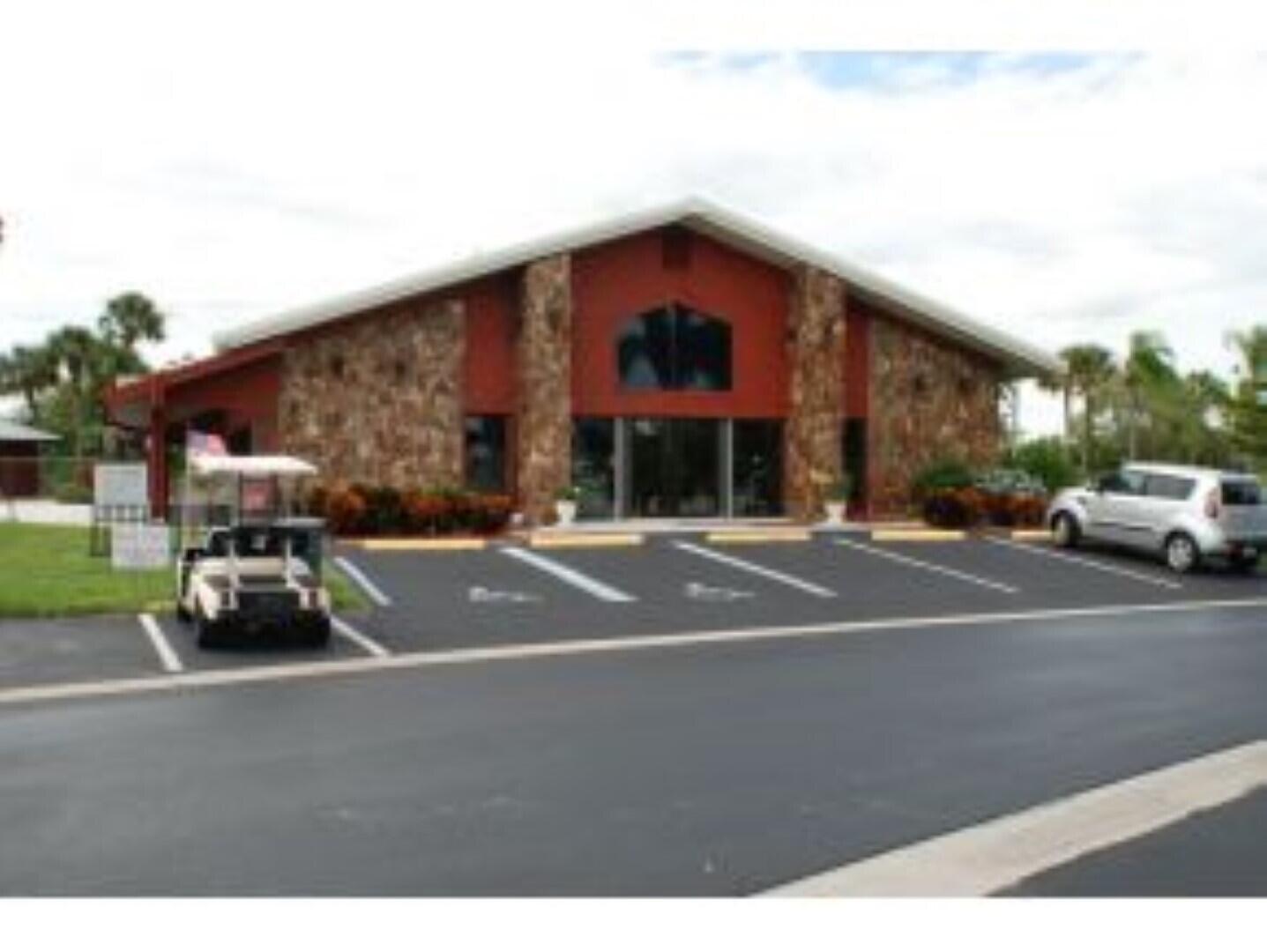 1692 Southwest 35th Circle Okeechobee, FL 34974 - Photo 29 of 30 a view of street with parked cars