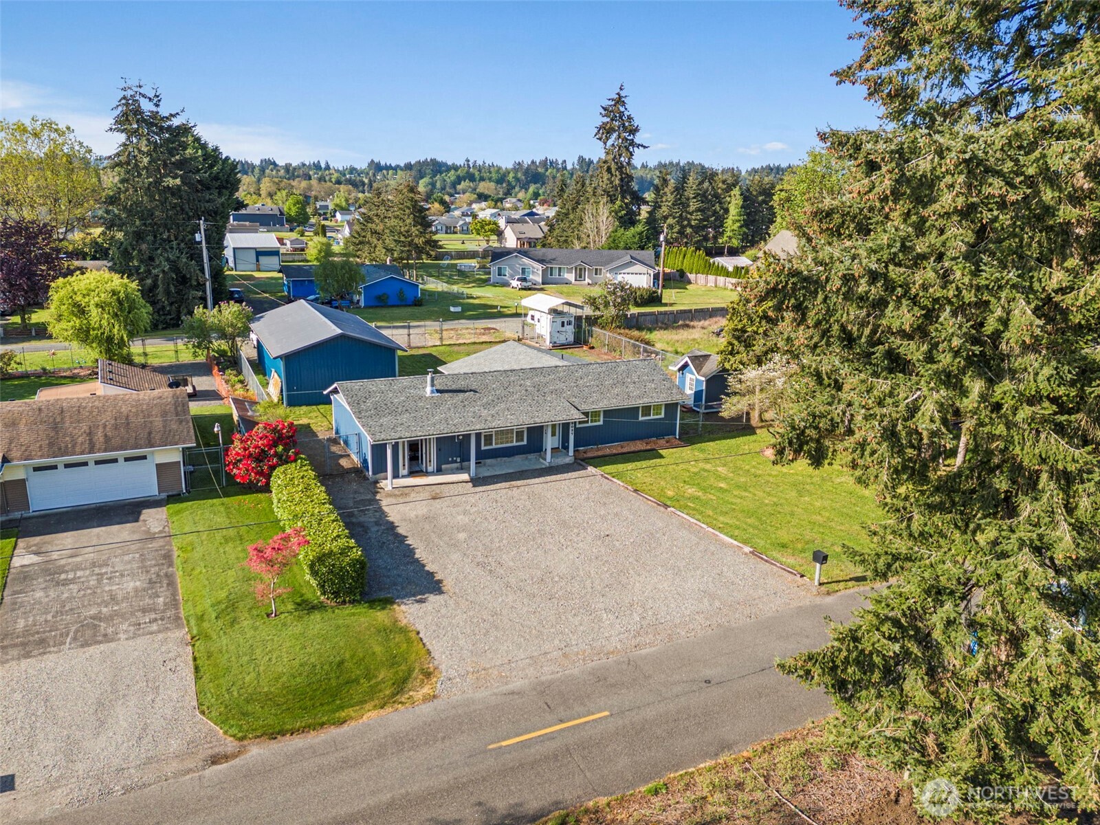 9037 178th Avenue Southwest Rochester, WA 98579 - Photo 1 of 33 a view of a house with outdoor space and seating area