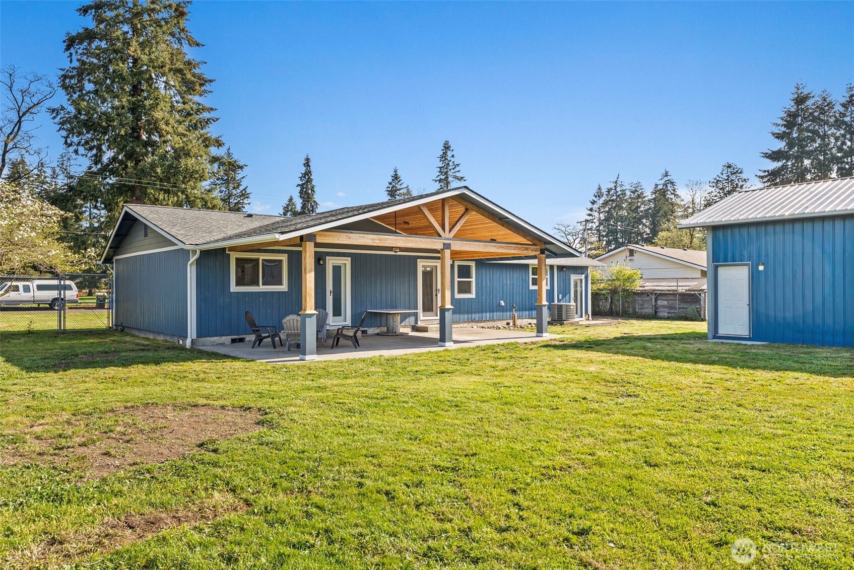 9037 178th Avenue Southwest Rochester, WA 98579 - Photo 22 of 33 a view of a house with a swimming pool with a yard