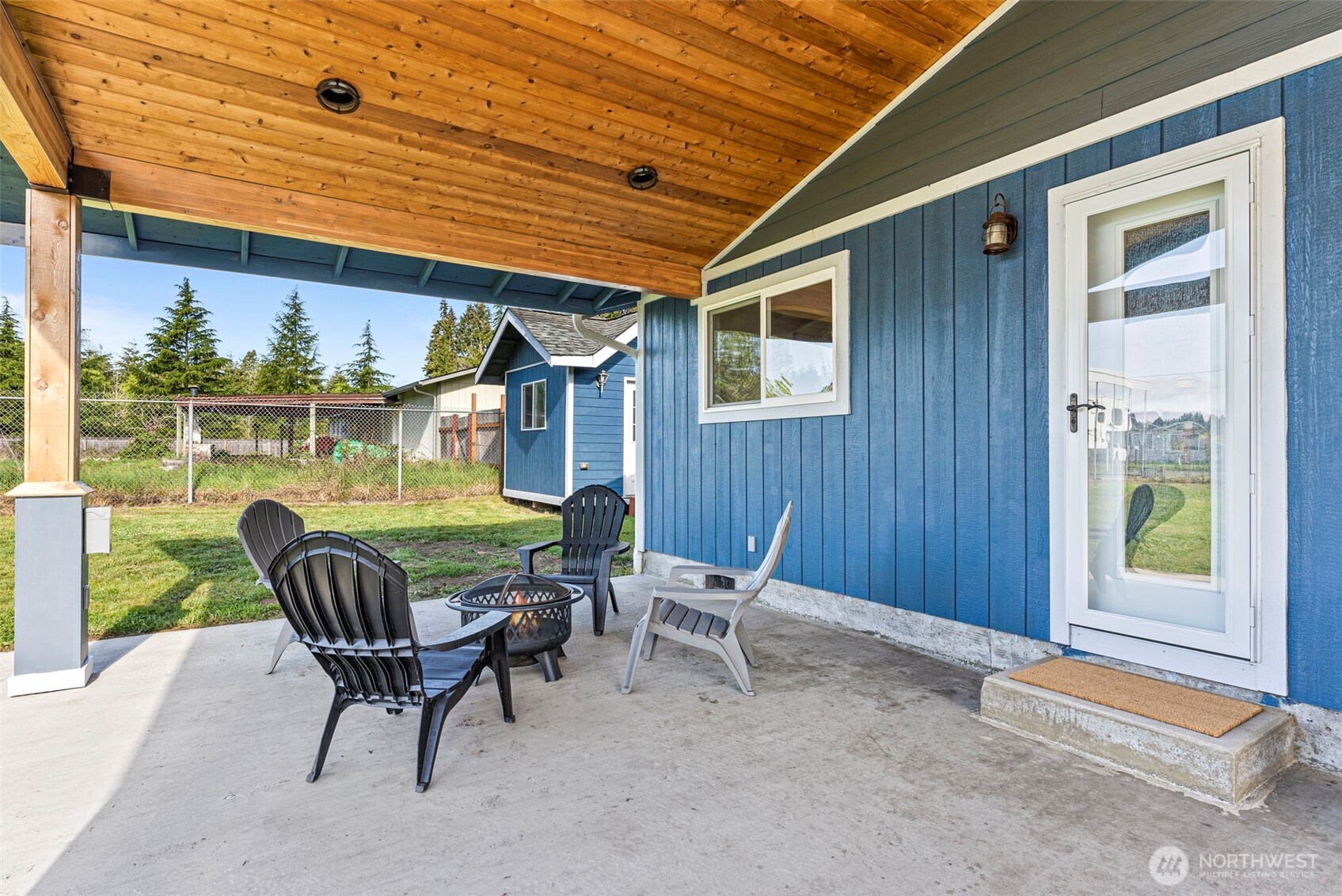 9037 178th Avenue Southwest Rochester, WA 98579 - Photo 23 of 33 a view of a porch with furniture and yard