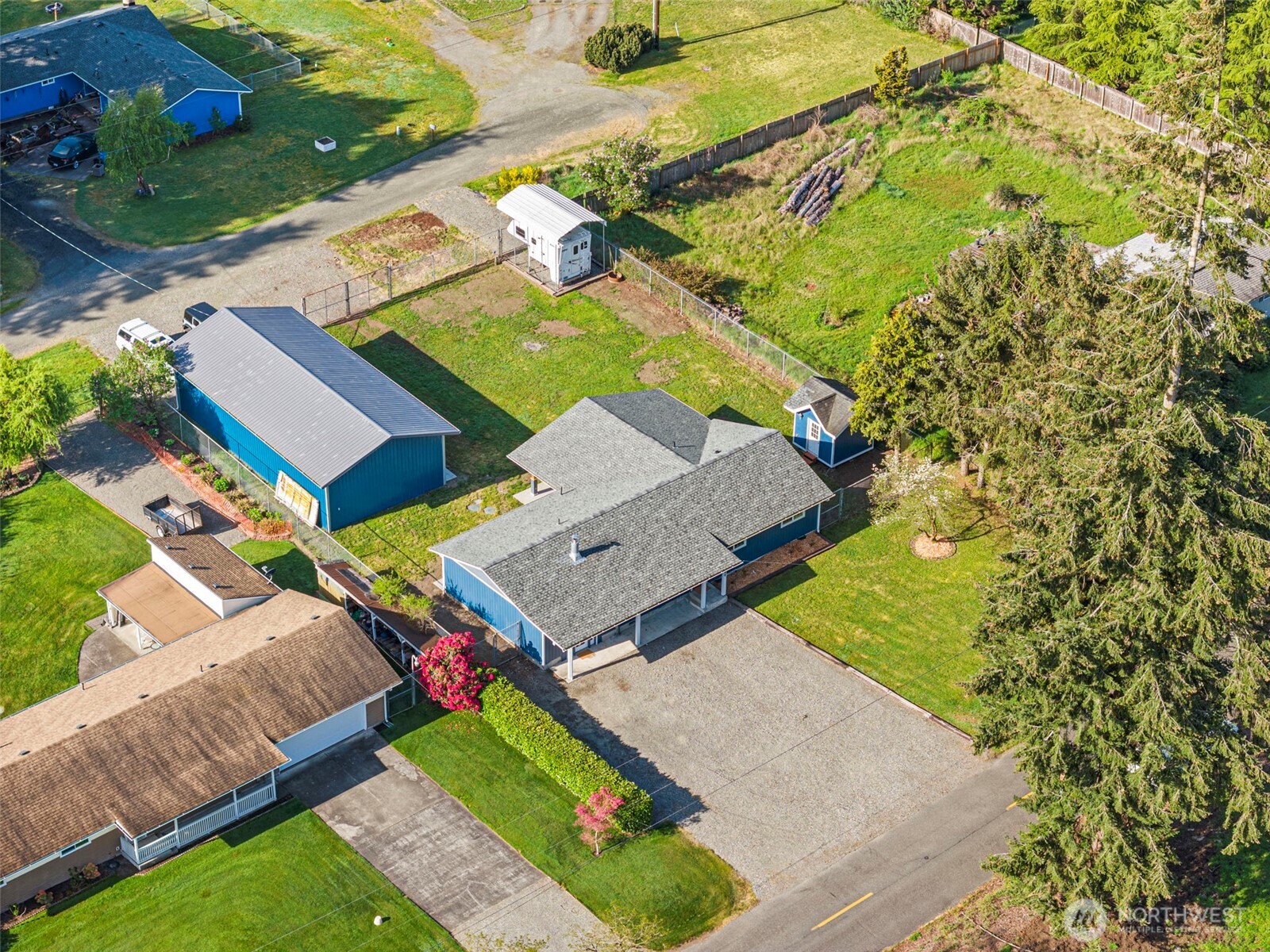9037 178th Avenue Southwest Rochester, WA 98579 - Photo 3 of 33 an aerial view of a house with a garden