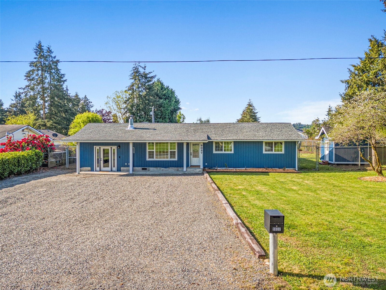 9037 178th Avenue Southwest Rochester, WA 98579 - Photo 31 of 33 a front view of a house with a yard