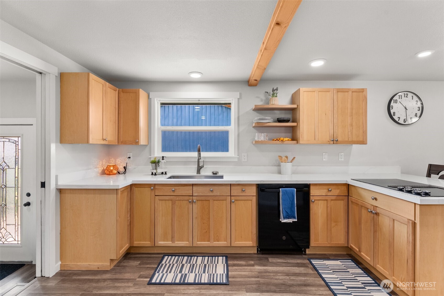 9037 178th Avenue Southwest Rochester, WA 98579 - Photo 9 of 33 a kitchen with stainless steel appliances granite countertop a sink and cabinets
