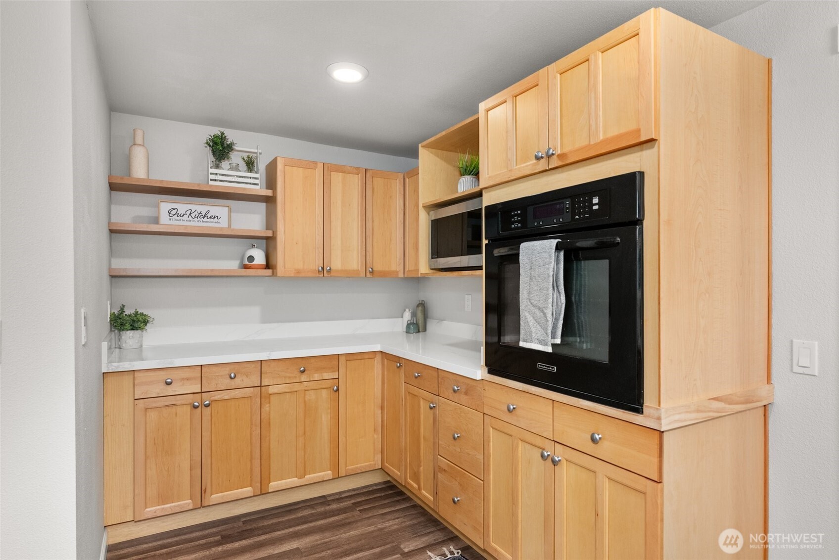 9037 178th Avenue Southwest Rochester, WA 98579 - Photo 10 of 33 a kitchen with stainless steel appliances granite countertop a sink a stove and cabinets