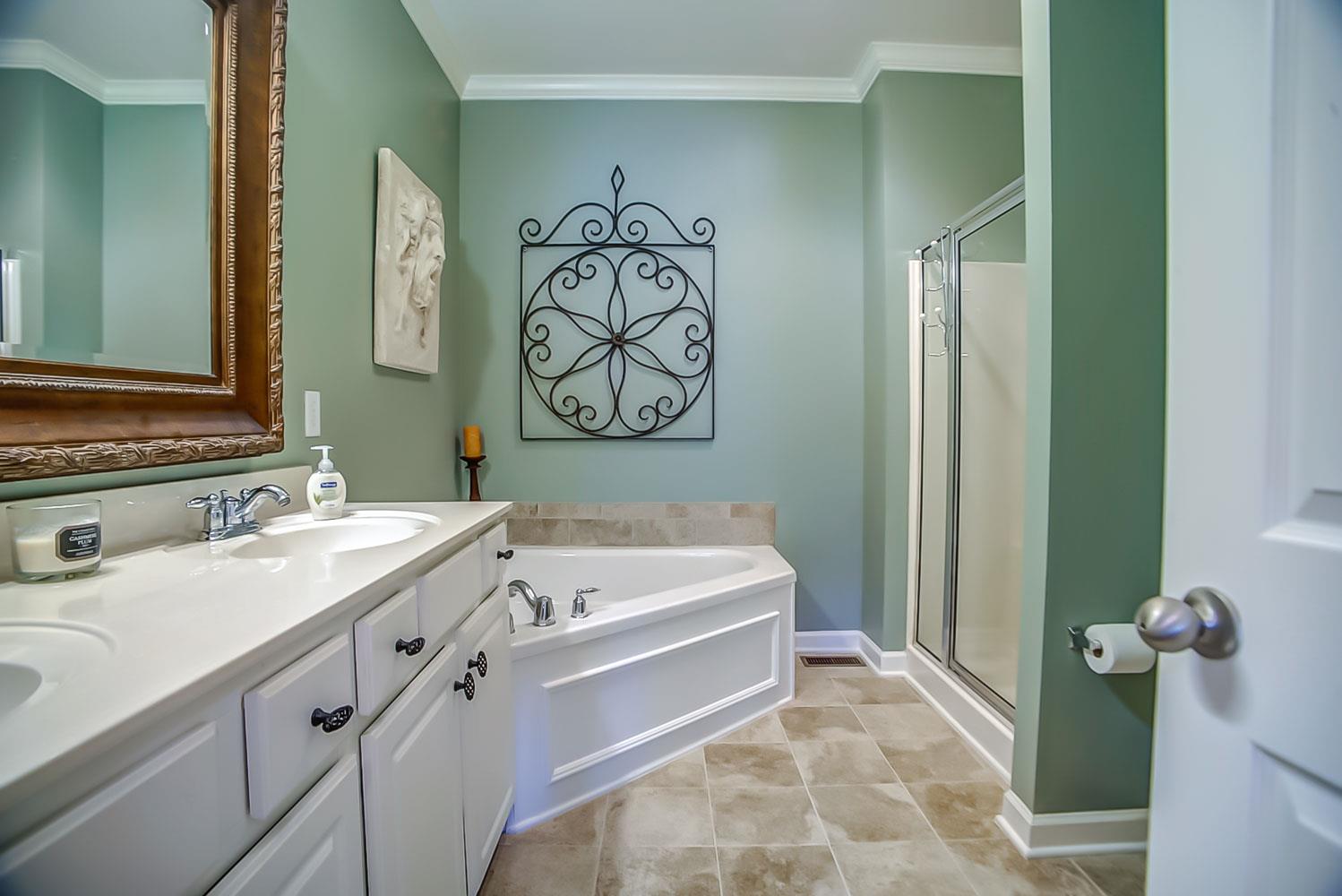 1717 Decatur Circle Franklin, TN 37067 - Photo 16 of 20 Soaking tub and separate shower plus new tile floor. Photo paint color does not properly represent the true soft color of this space.