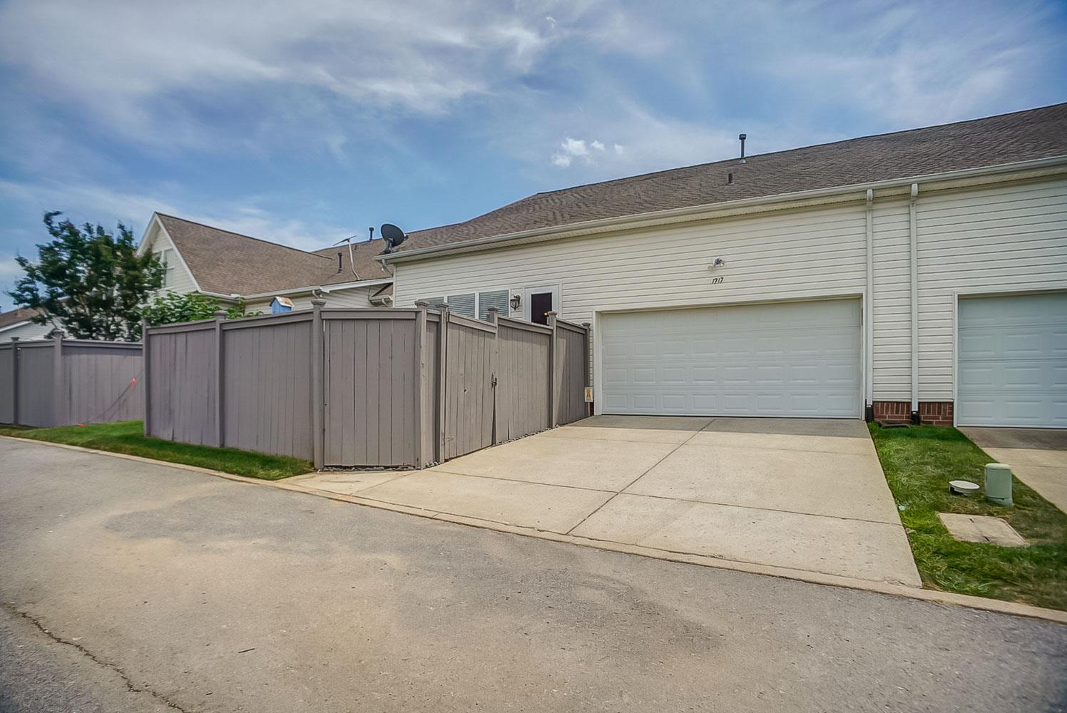 1717 Decatur Circle Franklin, TN 37067 - Photo 20 of 20 Come into the oversized two-car garage and through the separate Laundry Room and into the Kitchen.