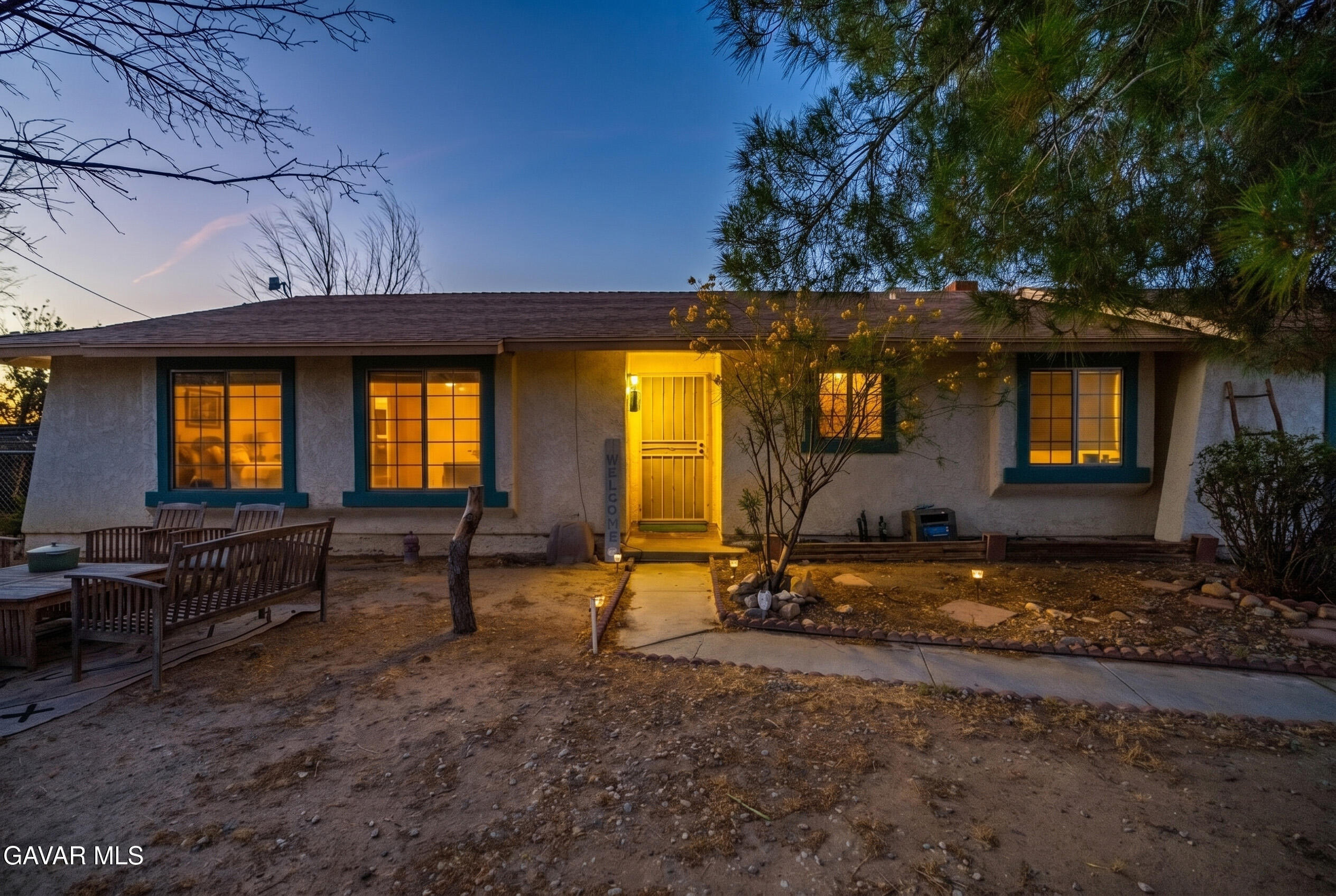 20539 East Ave R Palmdale, CA 93591 - Photo 8 of 55 a view of house with backyard and outdoor seating