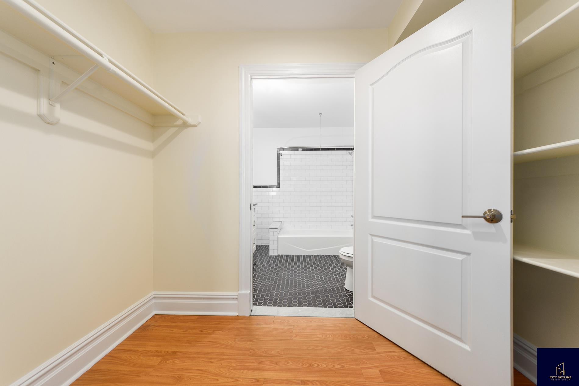 19-19 24th Avenue, Unit L706 Queens, NY 11102 - Photo 17 of 19 a view of an empty room