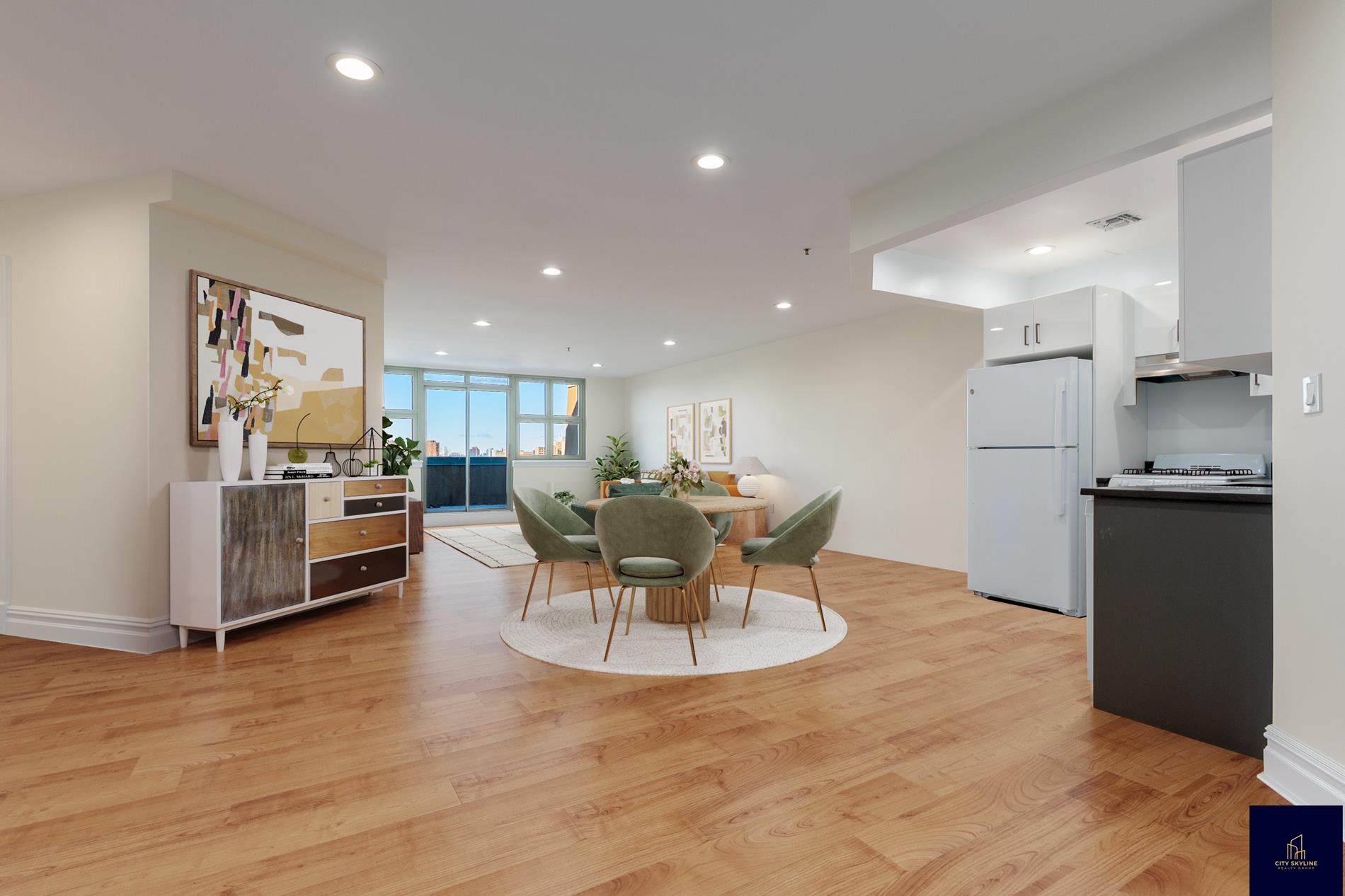 19-19 24th Avenue, Unit L706 Queens, NY 11102 - Photo 3 of 19 a kitchen with stainless steel appliances kitchen island granite countertop a refrigerator and a stove top oven