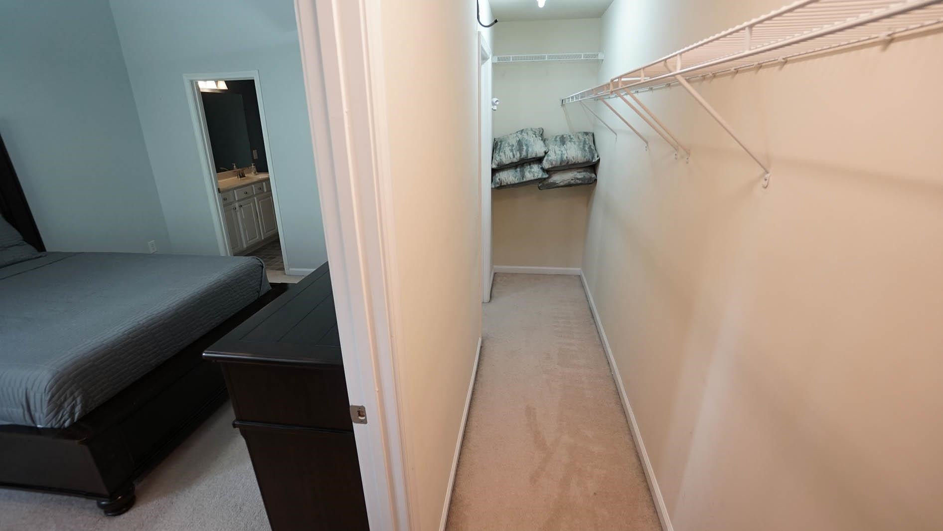 7842 Silverthread Lane Raleigh, NC 27617 - Photo 19 of 26 *Large Primary Bedroom Closet*