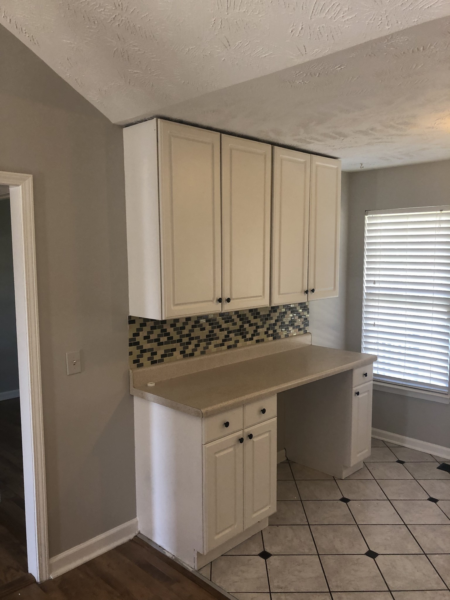 1013 Saddlestone Drive Hermitage, TN 37076 - Photo 3 of 16 a bathroom with a sink and a mirror