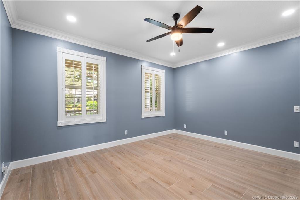 10 Copaire Road Stuart, FL 34996 - Photo 12 of 48 a view of an empty room with a window