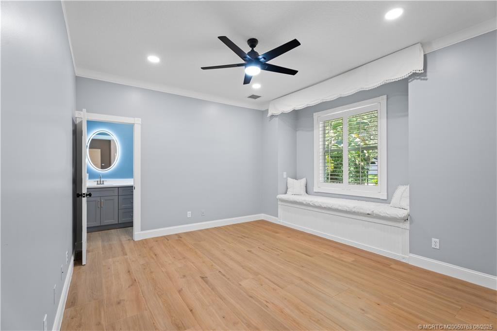 10 Copaire Road Stuart, FL 34996 - Photo 17 of 48 wooden floor in an empty room with a window