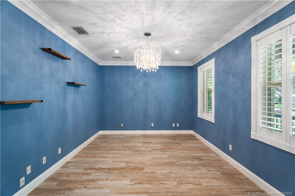 10 Copaire Road Stuart, FL 34996 - Photo 21 of 48 a view of an empty room with a window