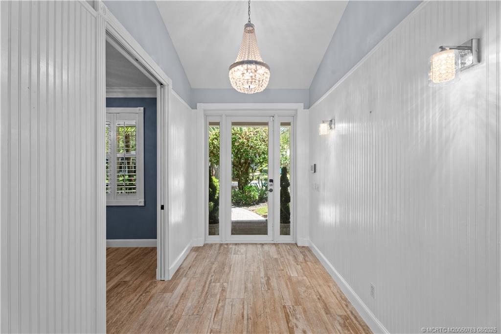 10 Copaire Road Stuart, FL 34996 - Photo 29 of 48 a view of an entryway with wooden floor