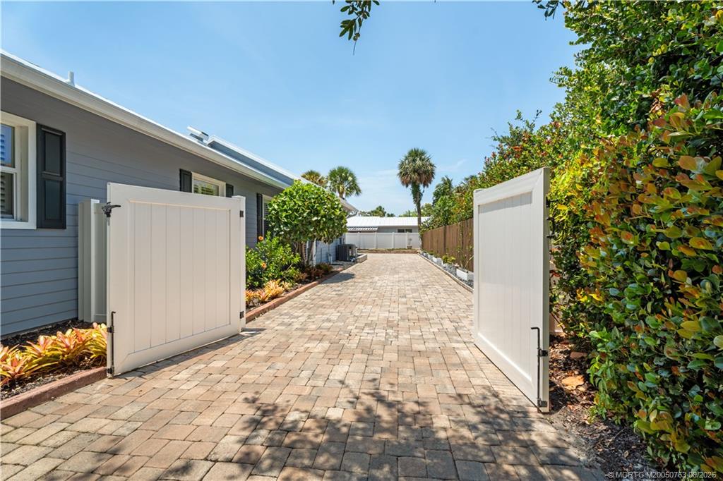 10 Copaire Road Stuart, FL 34996 - Photo 33 of 48 a view of a back yard of the house