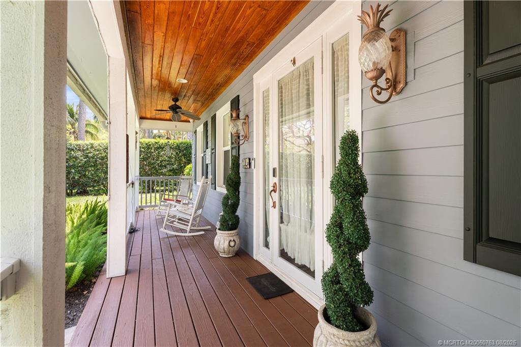 10 Copaire Road Stuart, FL 34996 - Photo 36 of 48 a view of a balcony with potted plants