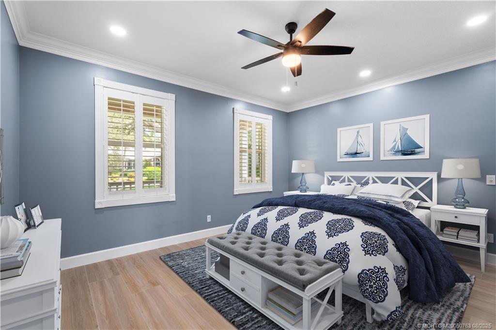 10 Copaire Road Stuart, FL 34996 - Photo 5 of 48 a bedroom with bed and a window