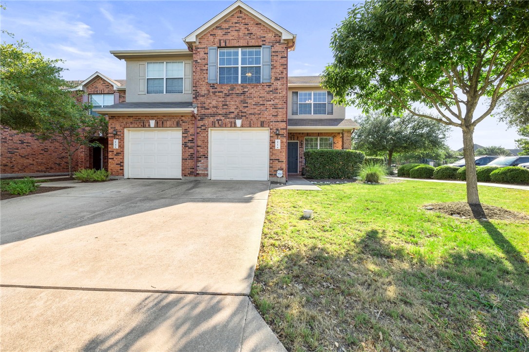 11 Verde Ranch Loop Leander, TX 78641 - Photo 1 of 1 End unit with extra parking nearby.