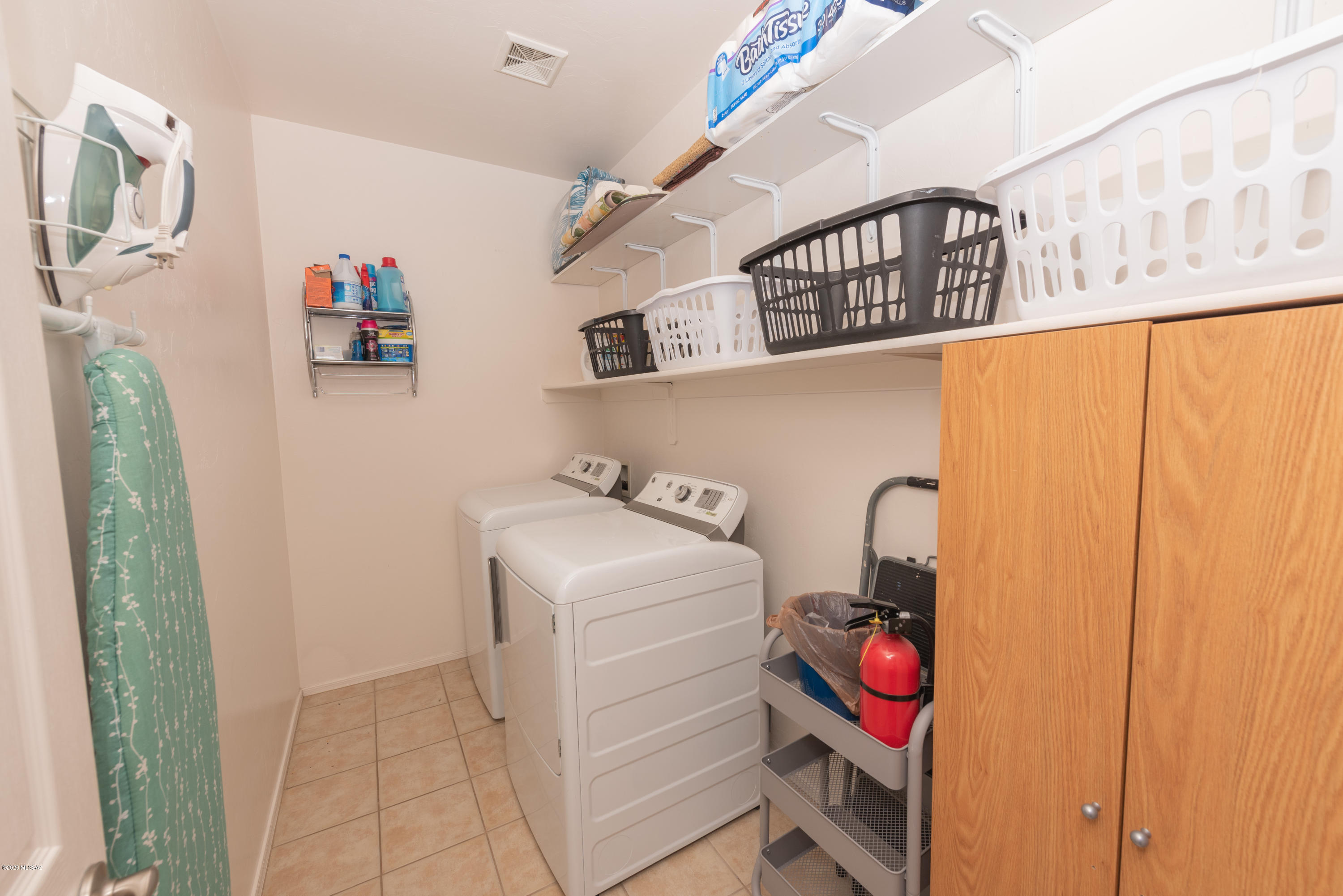 12910 Bloomington Loop Oro Valley, AZ 85755 - Photo 17 of 30 a utility room with dryer and washer