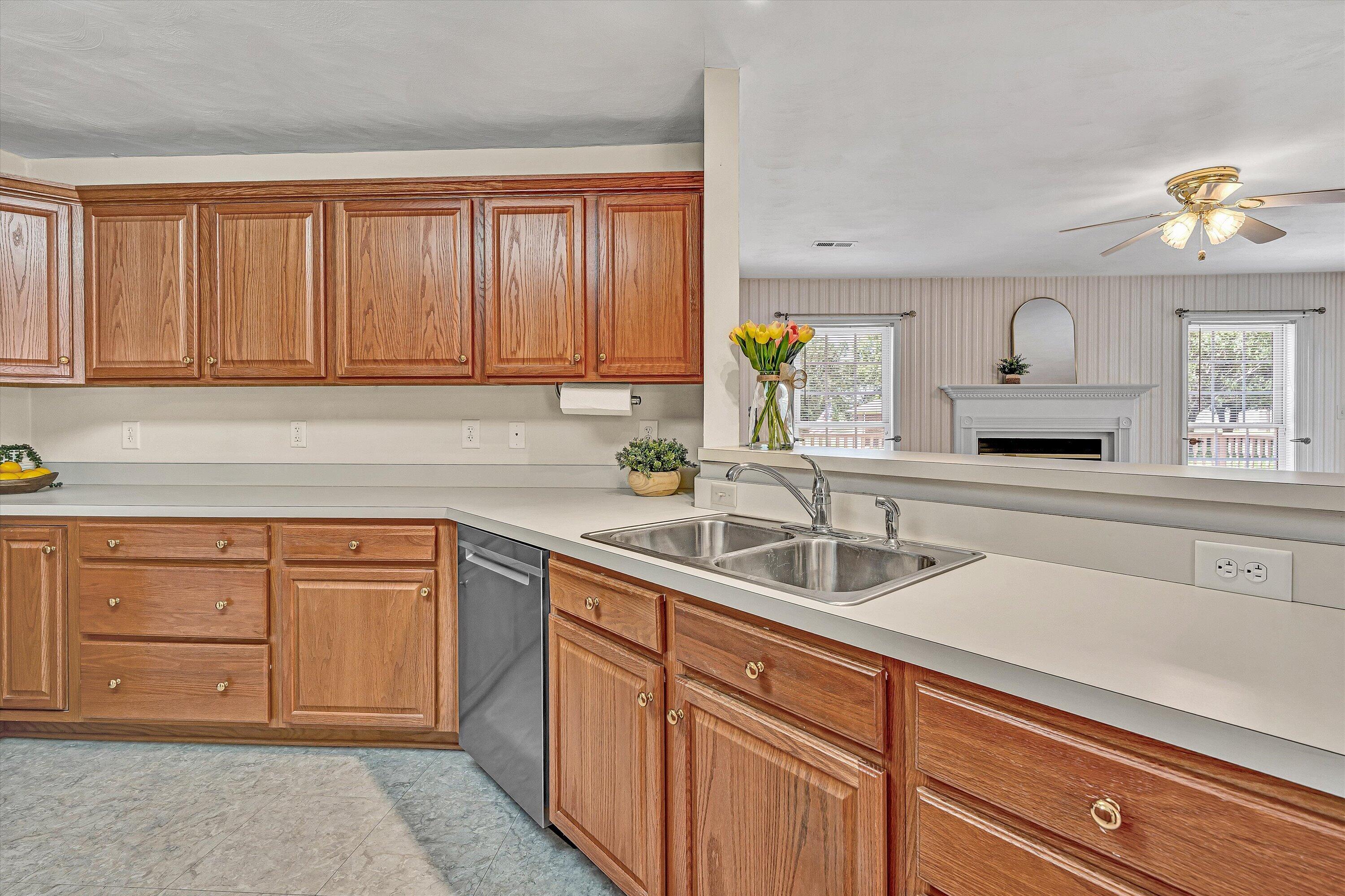 3516 Pinnacle Ridge Road Northeast Roanoke, VA 24012 - Photo 15 of 39 a kitchen with granite countertop a sink stainless steel appliances and cabinets