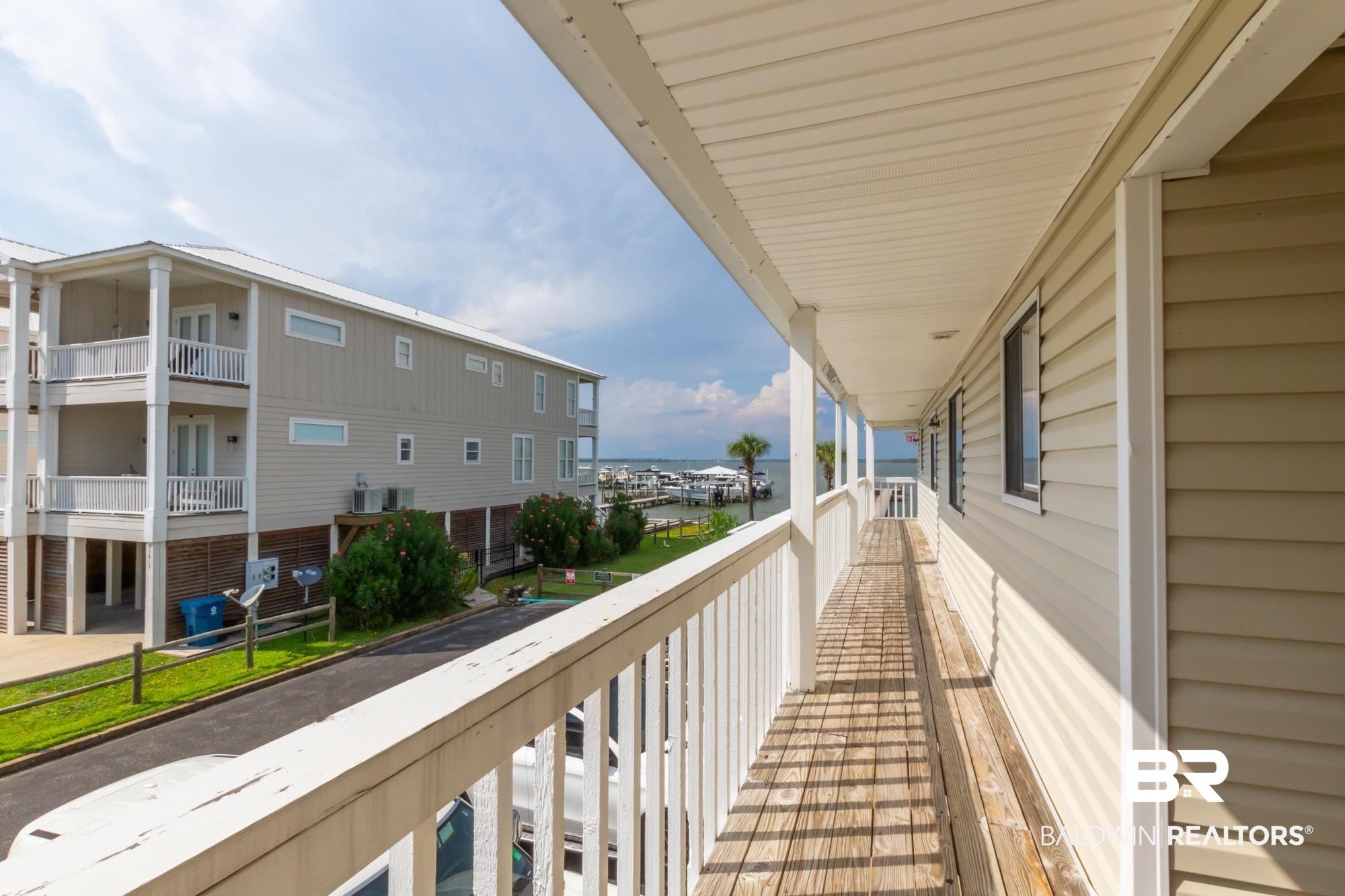 25925 -C Canal Road, Unit 203 Orange Beach, AL 36561 - Photo 29 of 57 Balcony featuring central AC unit