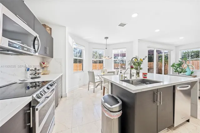 an aerial view of a city with lots of residential buildings