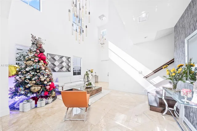 a living room with furniture and a table