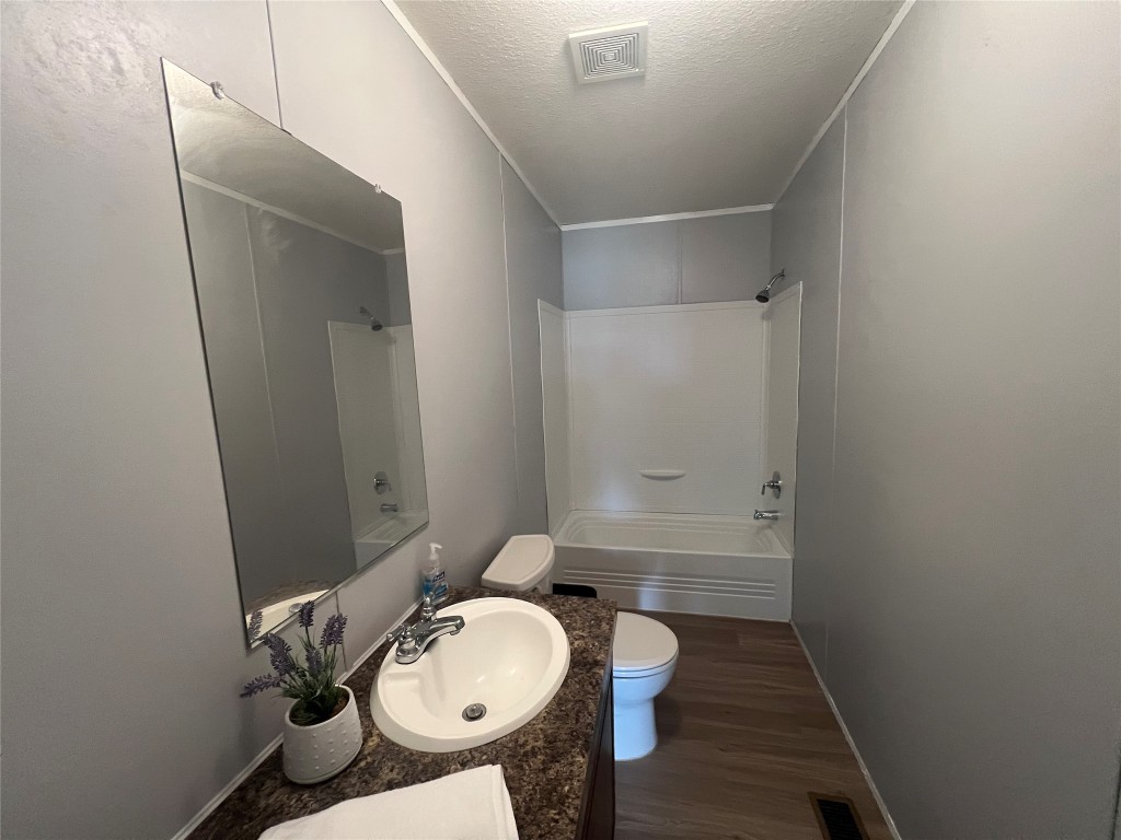 702 Paint Creek Road McDade, TX 78650 - Photo 22 of 40 a bathroom with a sink and a mirror