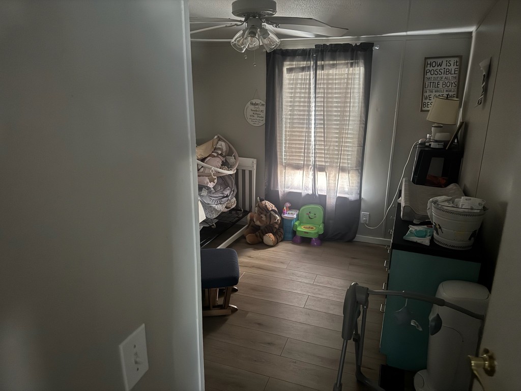 702 Paint Creek Road McDade, TX 78650 - Photo 36 of 40 a view of a livingroom with furniture and a window