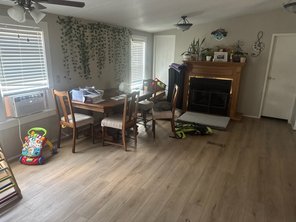 702 Paint Creek Road McDade, TX 78650 - Photo 37 of 40 a living room with furniture and a fireplace