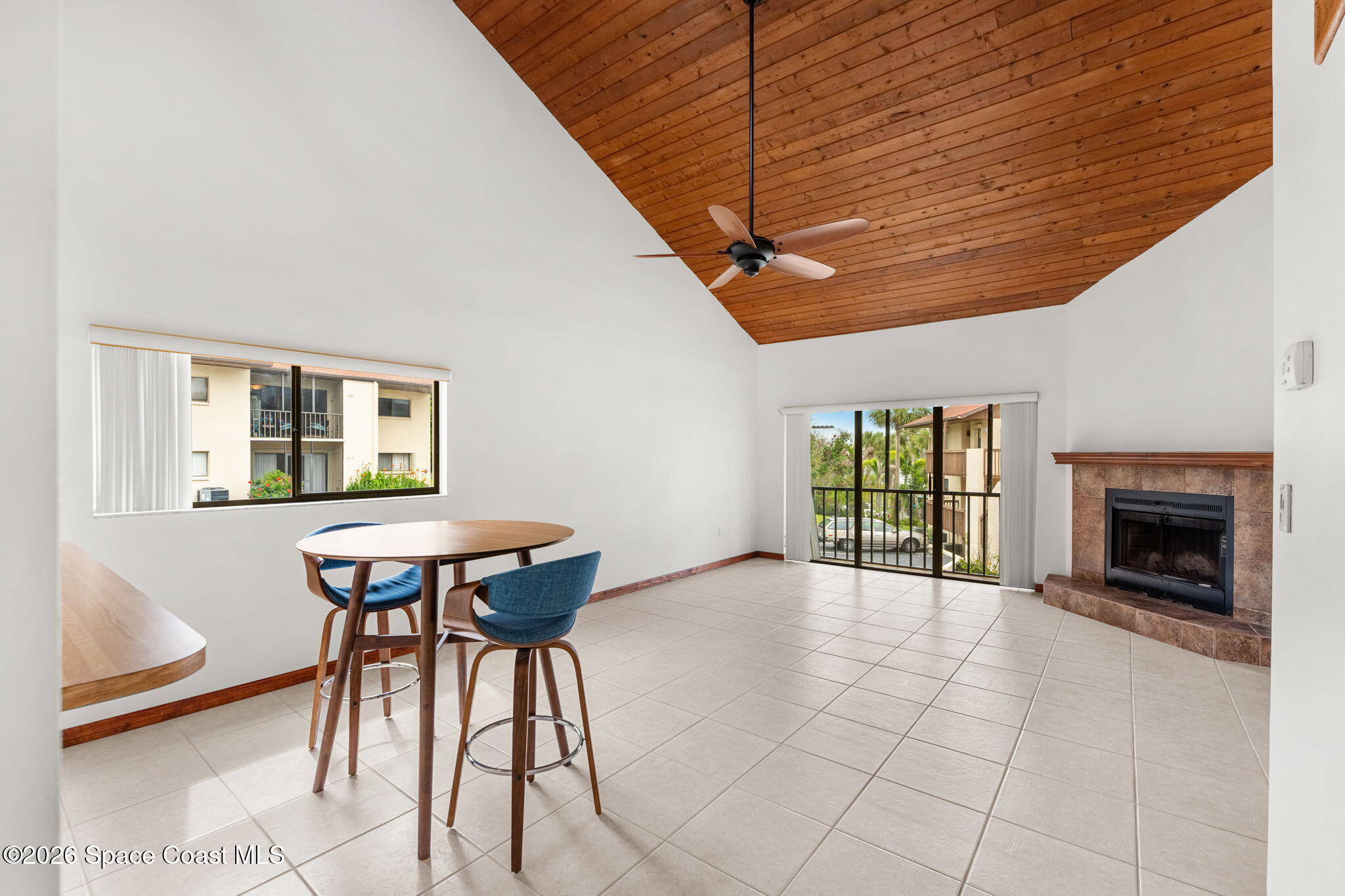 3121 Kirkland Road Northeast Palm Bay, FL 32905 - Photo 12 of 52 a view of a livingroom with furniture and a fireplace